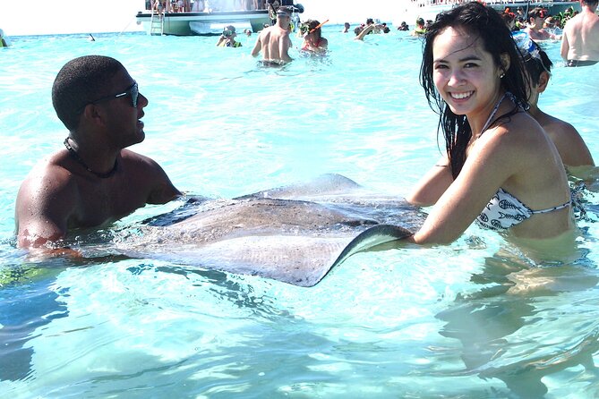 Full-Day Private Stingray City Snorkeling and Starfish Beach Tour - Who Will Enjoy This Grand Cayman Boat Trip?