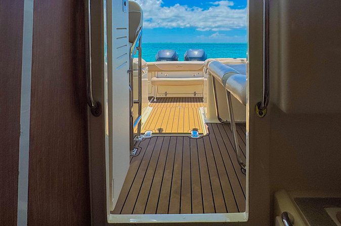 Grand Cayman Private Custom Boating Adventure - Kaibo for food, marina views, and a beach stop