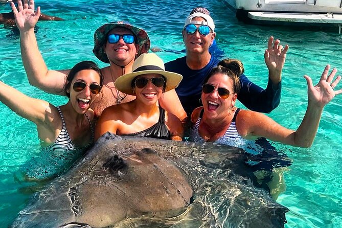 Private Charter 34ft Express Cruiser Stingay City Reef Snorkeling - Stingray City: the big moment in waist-deep water